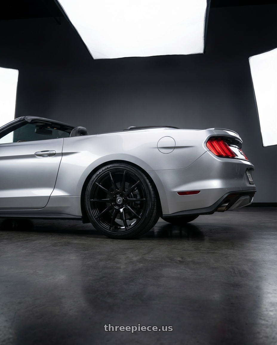 2018 ford mustang with Forgestar CF10 5x114.3 20x10.5 +40 Gloss Black wheels rear three quarter view slight stretch tires