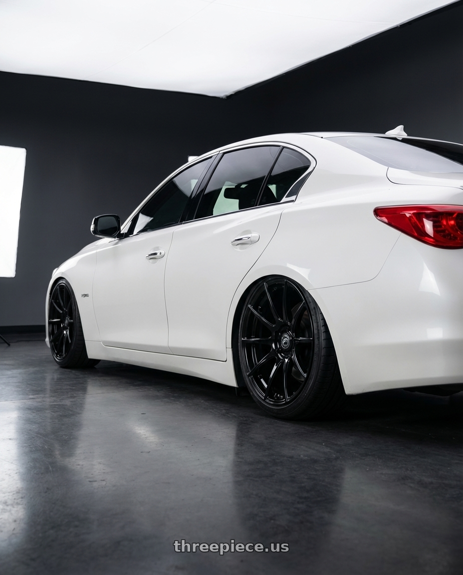2020 Infiniti Q50 with Forgestar CF10 5x114.3 20x9 +35 Gloss Black wheels rear three quarter view slight stretch tires
