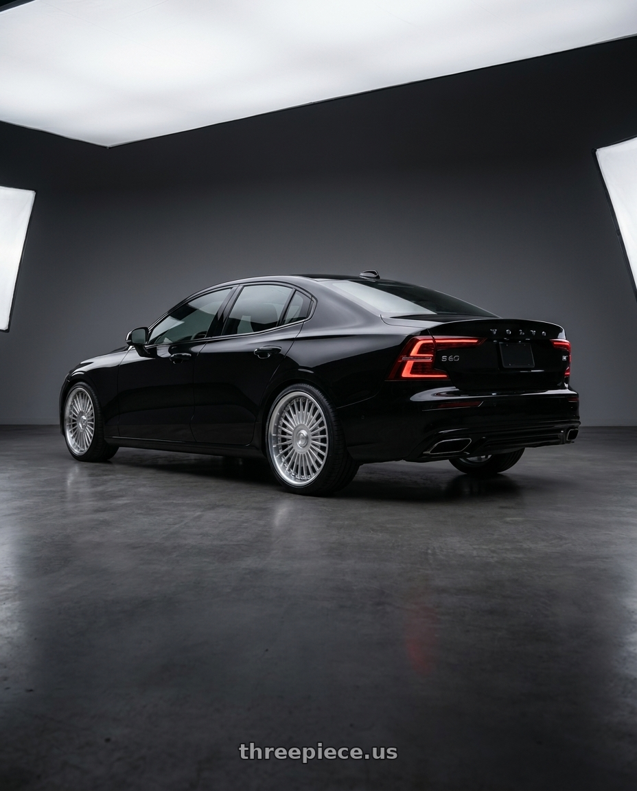 2022 Volvo s60 with MRR VP4 5x108 19x8.5 +35 Silver Machined Lip wheels rear three quarter view square tires
