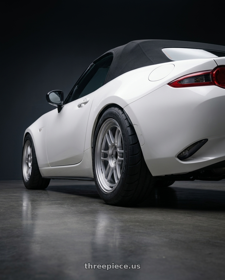 2024 nd mx5 soft top with Enkei RPF1 4x100 16x8+38 Silver wheels rear three quarter view meaty tires