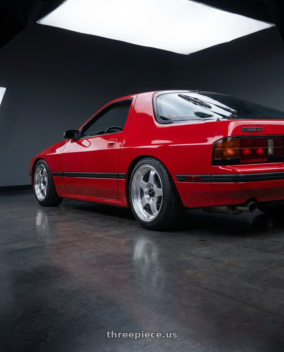 1987 Mazda Rx7 Base Red with Vors SP1 4x100 15x7  +35 Silver Machine Face Lip wheels rear three quarter view slight stretch tires