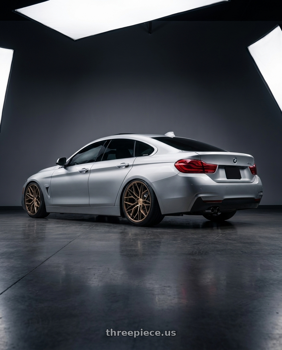 2018 bmw 430i with Rohana RFC3 5x112 19x8.5 +25 Machine Bronze wheels rear three quarter view slight stretch tires