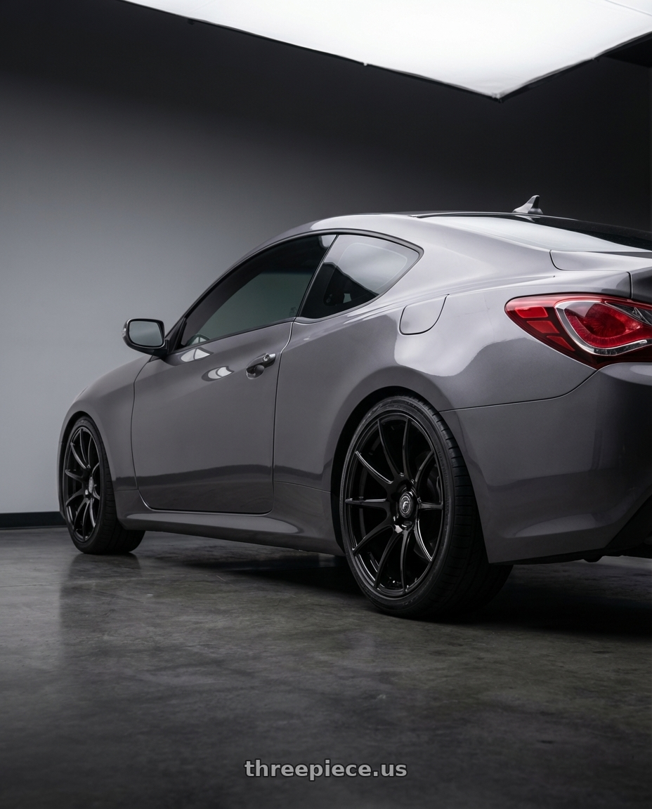 2014 Hyundai Genesis Coupe with Forgestar CF10 5x114.3 19x10 +42 Gloss Black wheels rear three quarter view square tires