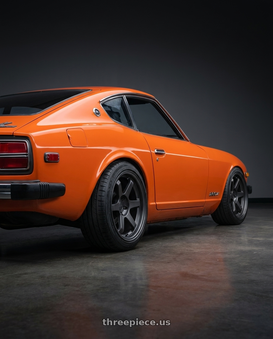 1978 Datsun 280z Orange  with 9six9 SIX-1 5x114.3 18X10 +35 Carbon Gray wheels rear three quarter view square tires