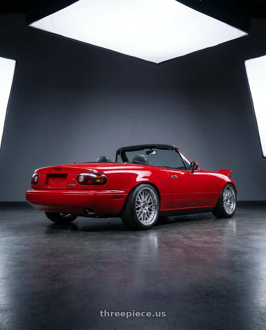 1992 Mazda Miata with Work Vs-Xx 5x112 18x8+42 T Disk Light Grey Silver wheels rear three quarter view square tires