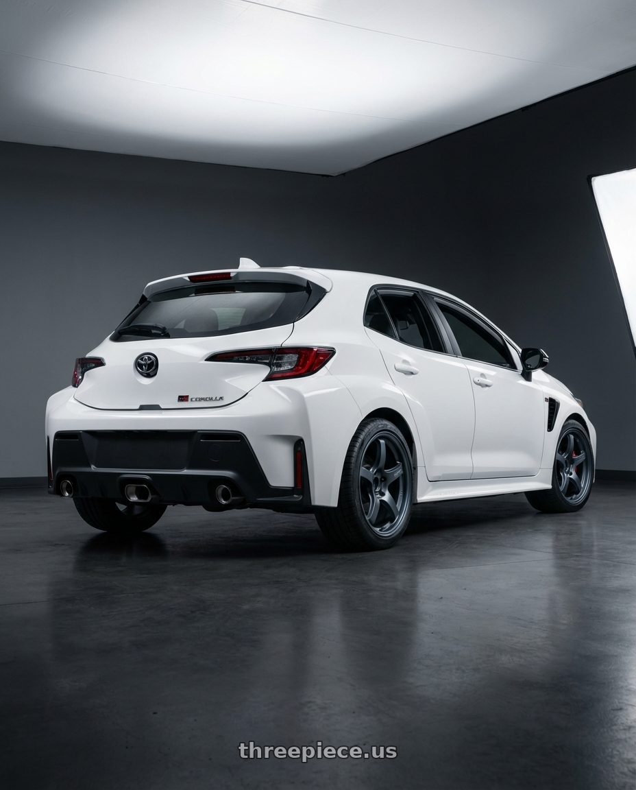 2023 GR Corolla with Gram Lights 57CR 5x114.3 18x9.5+22 Gunblue II wheels rear three quarter view square tires