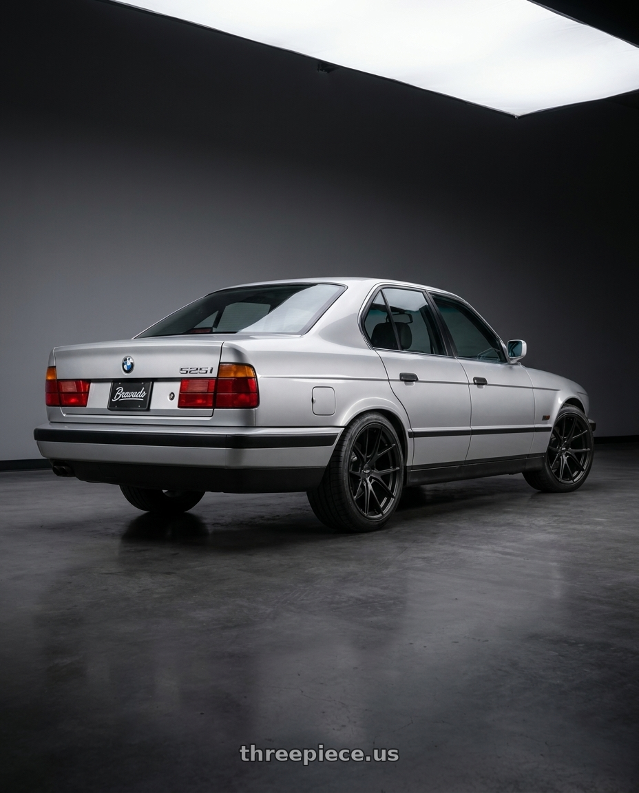 Bmw e34 525i 1995 with Bravado 08B Tribute 5X115 18x9 +15 Matte Black wheels rear three quarter view square tires
