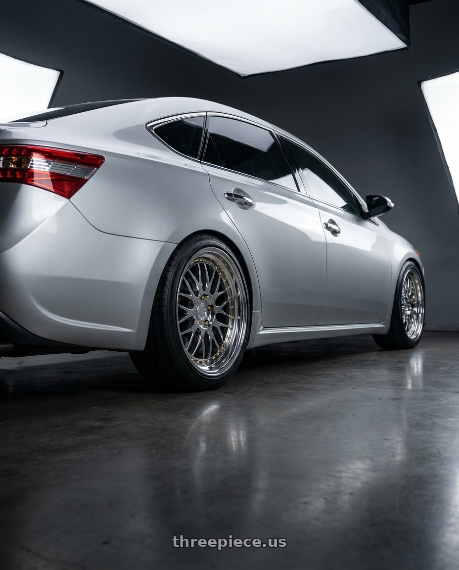 2013 toyota avalon with Aodhan DS03 5x114.3 18x9.5 +30 Vacuum Chrome w/Gold Rivets wheels rear three quarter view square tires