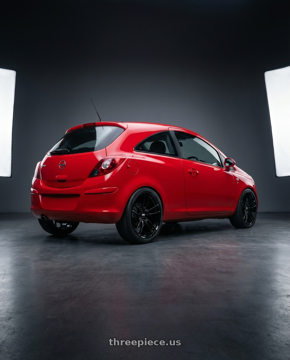 Opel Corsa D 2010  with P51 Wheels 101RF 5X114.3 19x11.5 +56 Gloss Black wheels rear three quarter view square tires