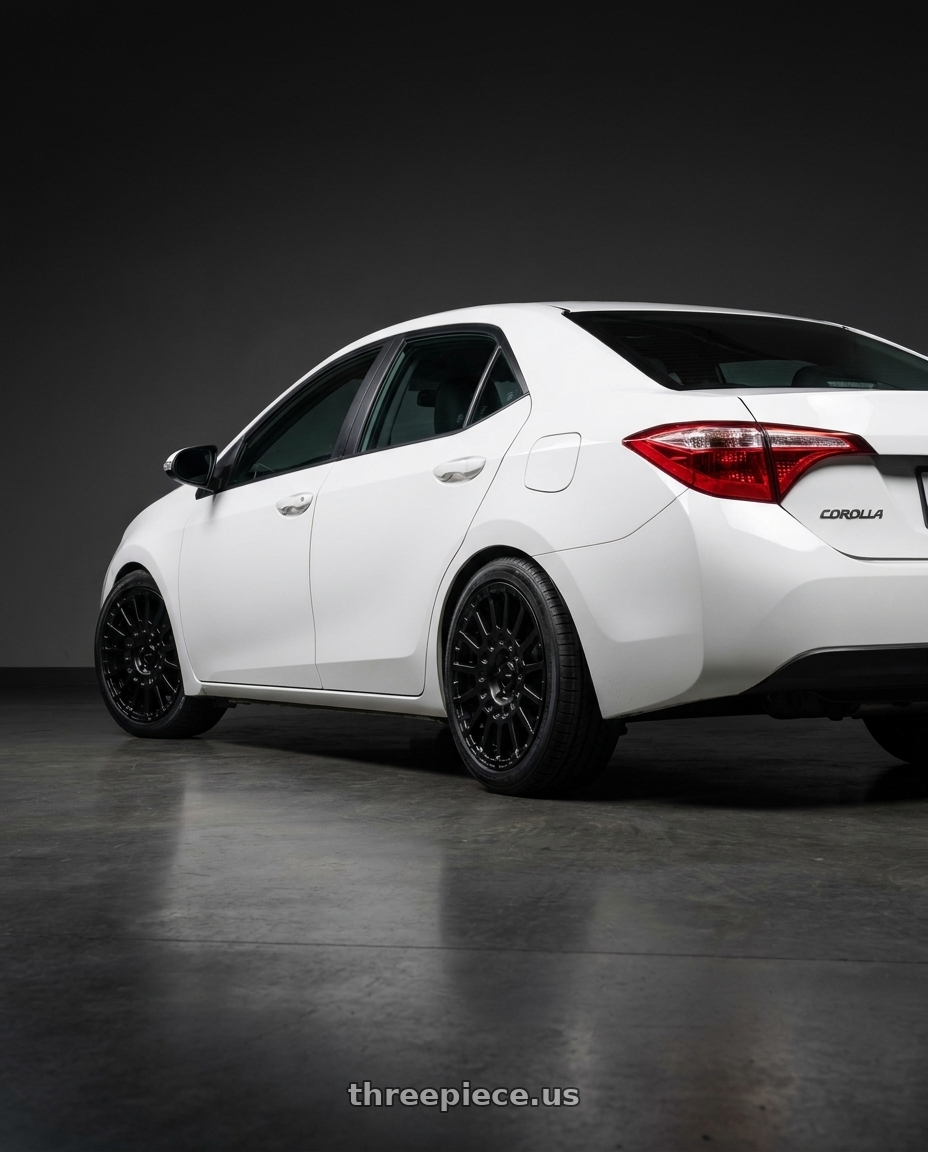 2018 Toyota Corolla with Enkei Overlander 5x100 17x7.5+35 Black wheels rear three quarter view square tires