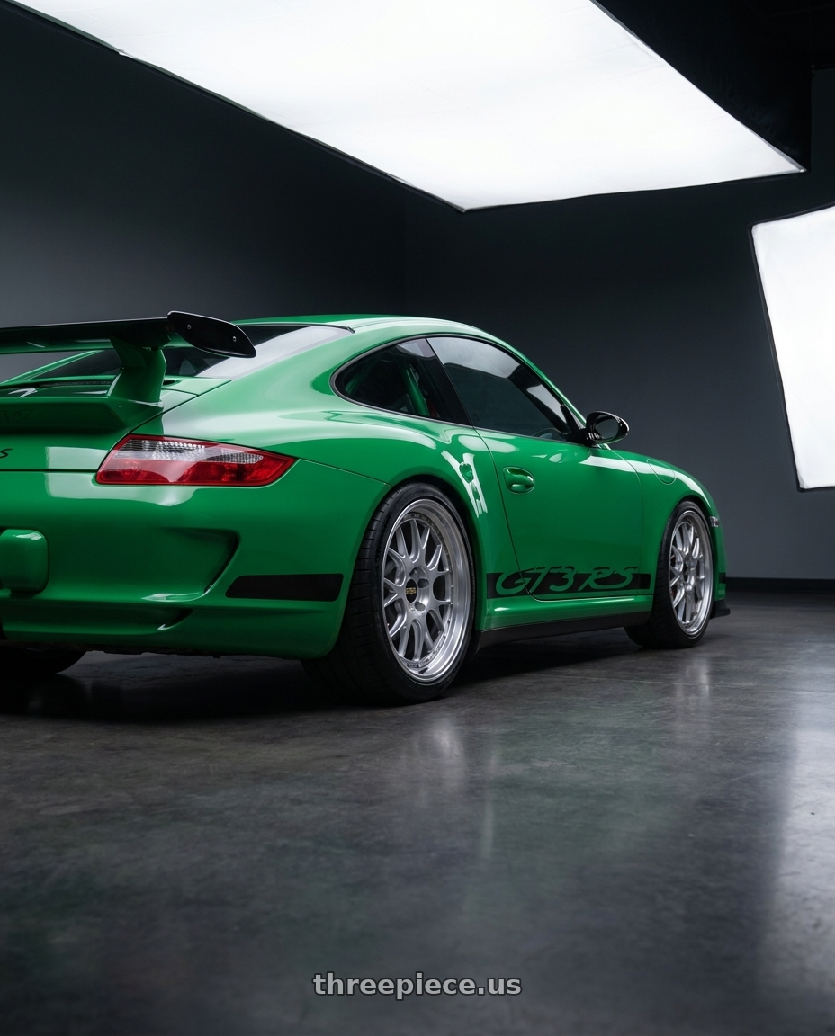 2007 Porsche 997 with BBS LM-R 5x114.3 19x8.5+43 Diamond Silver wheels rear three quarter view square tires