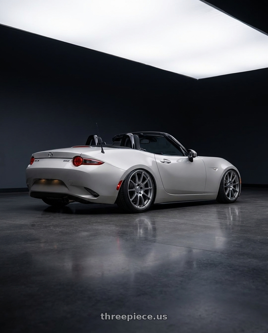 2021 Mazda MX-5 Miata ND with Ssr Gtv02 5x114.3 17x8+45  GLARE SILVER wheels rear three quarter view slight stretch tires