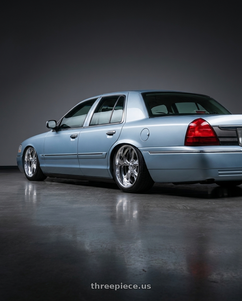 2011 Mercury Grand Marquis with Foose 2PC F201 NITROUS 5X120.65 17X8 +0 HIGH LUSTER POLISHED wheels rear three quarter view slight stretch tires