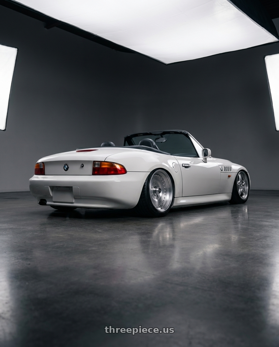 1997 BMW Z3 Roadster with Center Line Auto Drag 2.0 5X114.3 15x8.5 +3 Brushed wheels rear three quarter view slight stretch tires