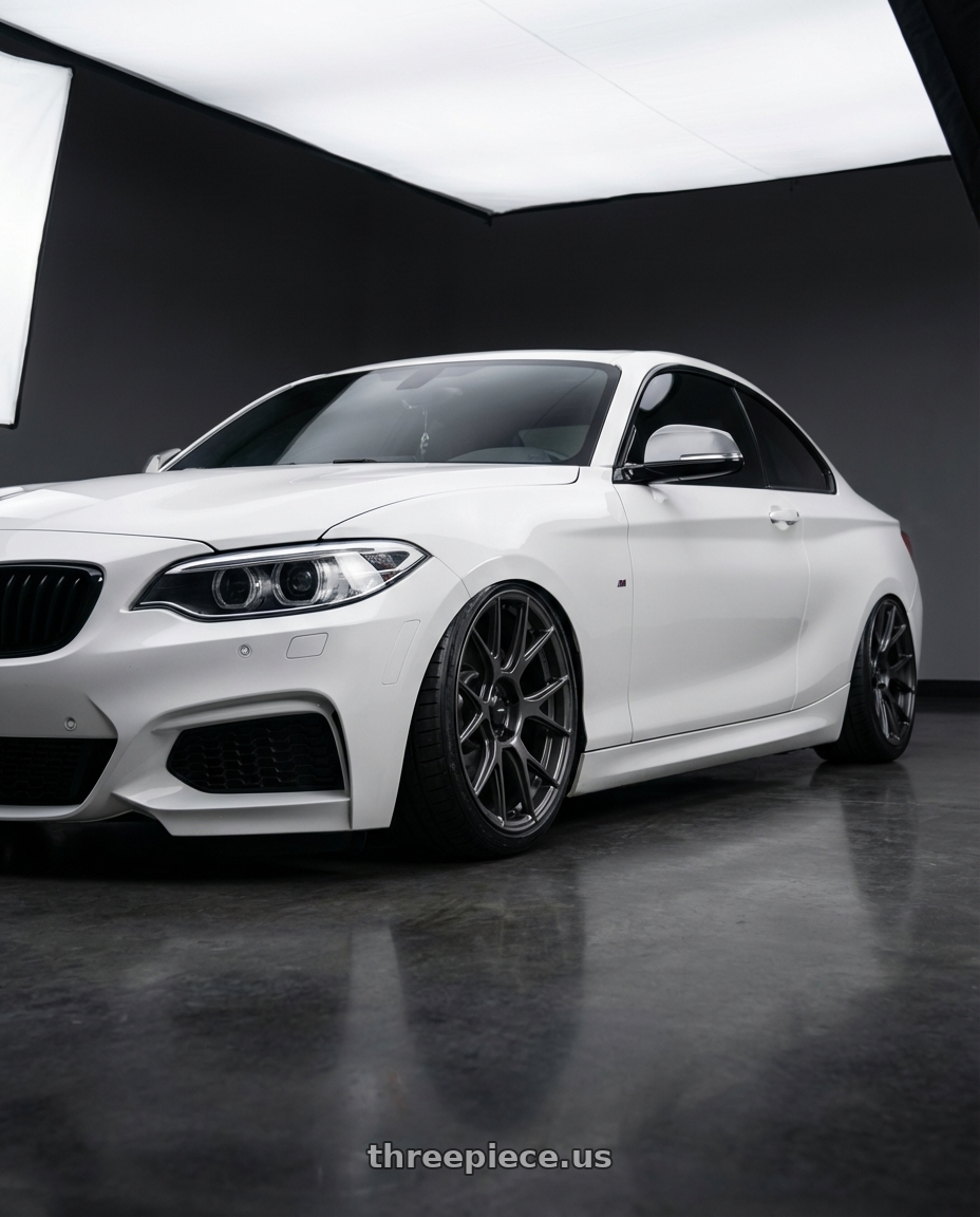 2018 BMW 2 Series F22 with Konig Ampliform 5x120 19x10+28 Dark Metallic Graphite wheels front three quarter view stanced stance