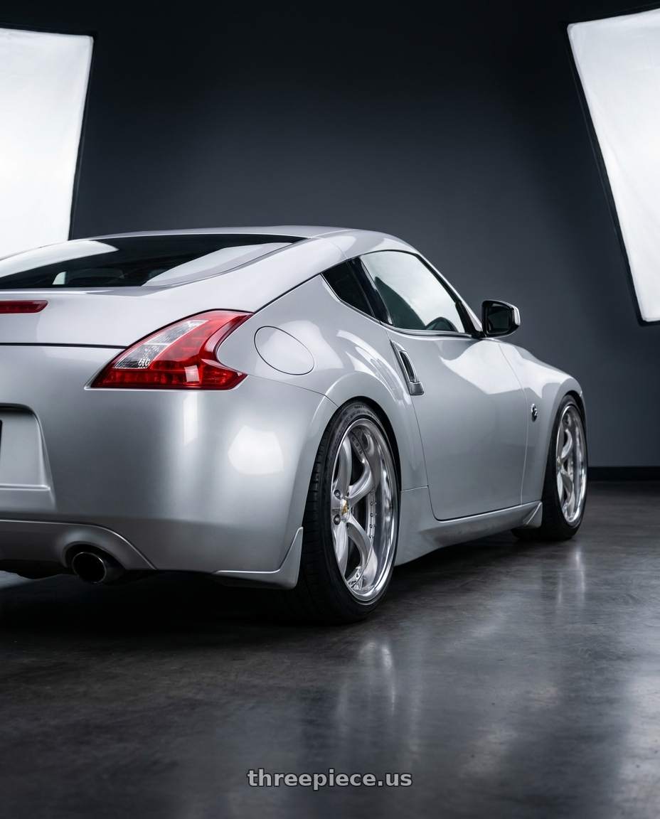 2009 Nissan 370Z with Work Wheels VS-KF 5X114.3 19x10.5+22 Light Grey Silver L Disk FULL REVERSE wheels rear three quarter view square tires