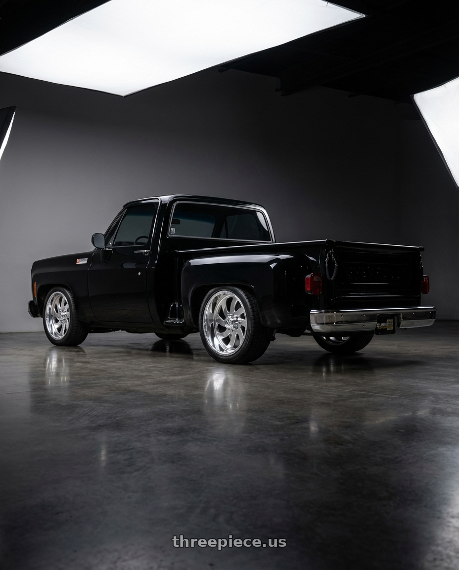 1974 GMC C10 with American Force 76 Blade SS 5X127 20X10 -18 POLISHED wheels rear three quarter view square tires