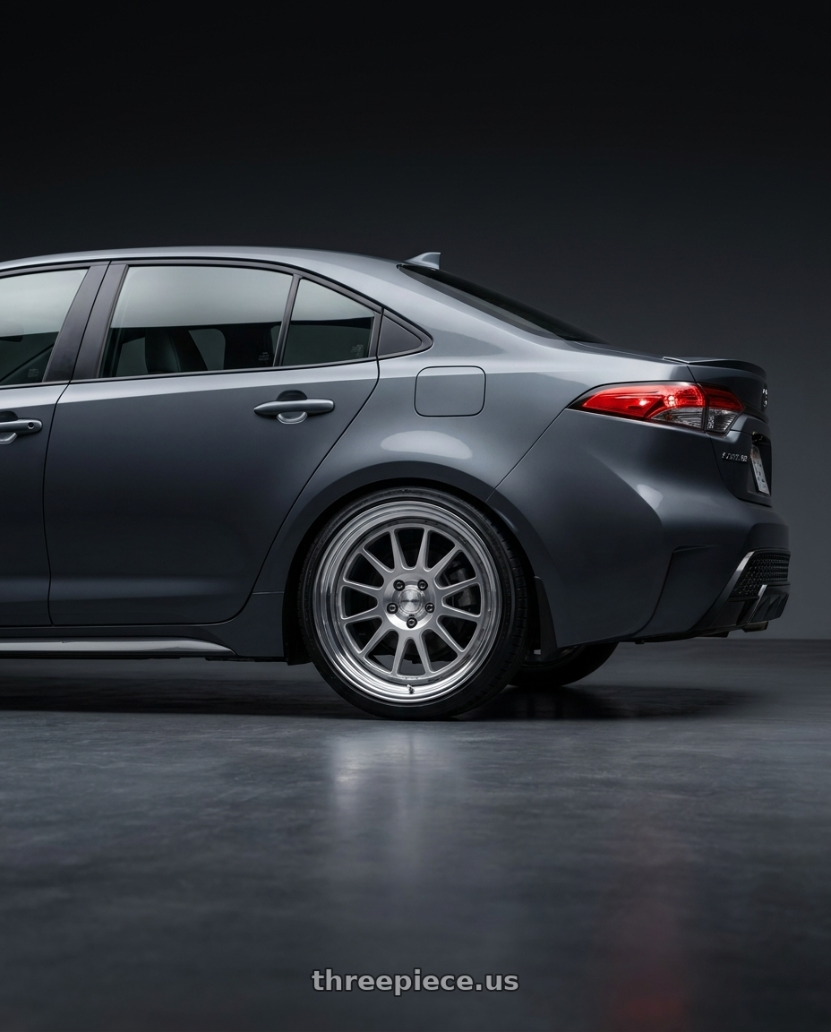 2023 Toyota Corolla xse with Work Seeker Fx 5x100 17x8+38 A Disk Matte Silver Polish wheels rear three quarter view slight stretch tires