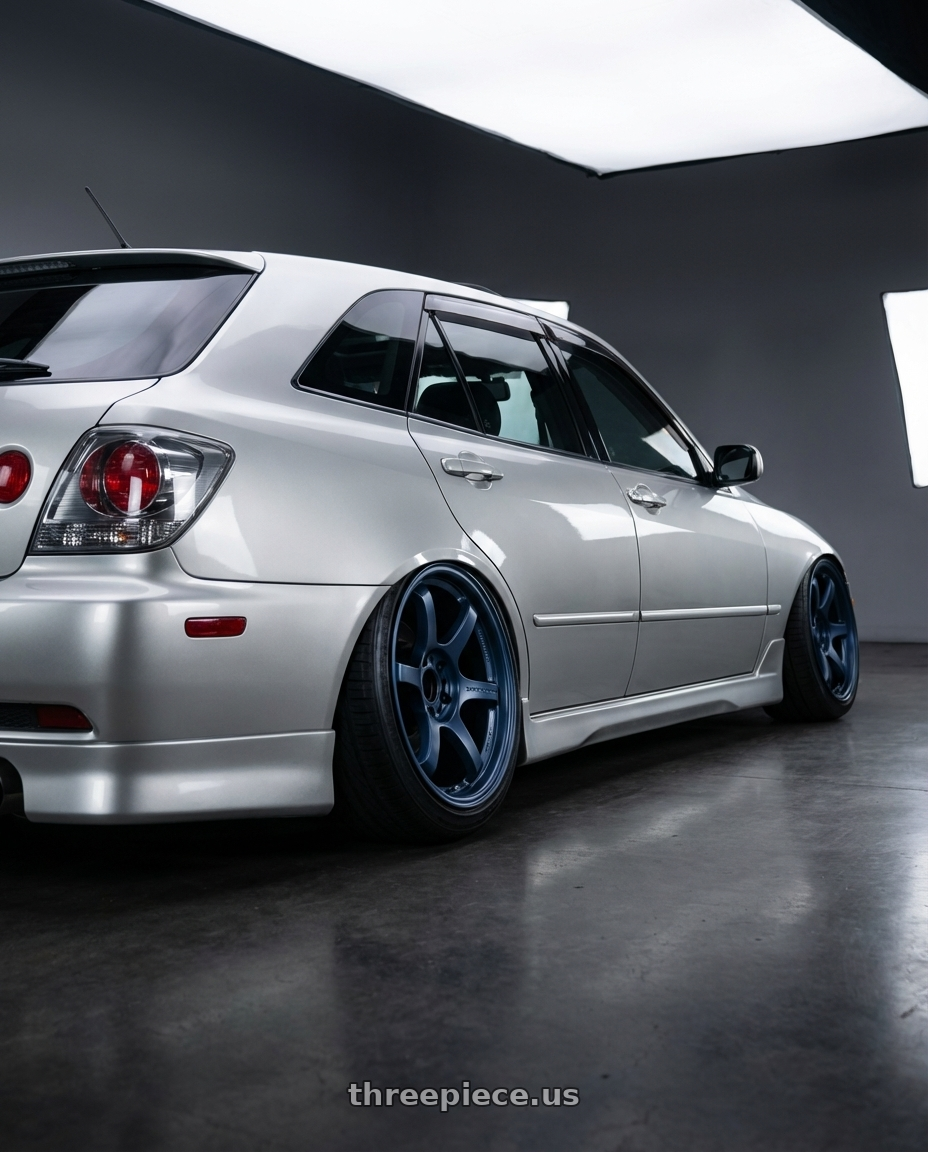 2002 lexus is300 sportcross with Gram Lights 57DR 5x100 17x9 +38 GUNBLUE 2 wheels rear three quarter view extreme stretch tires