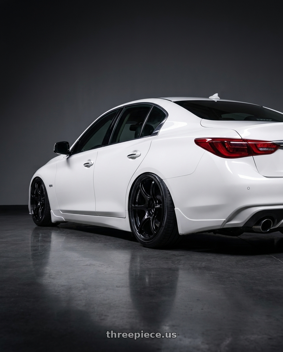 2020 Infiniti Q50 with Advan RGIII 5x114.3 19x9.0+25 Gloss Black wheels rear three quarter view slight stretch tires