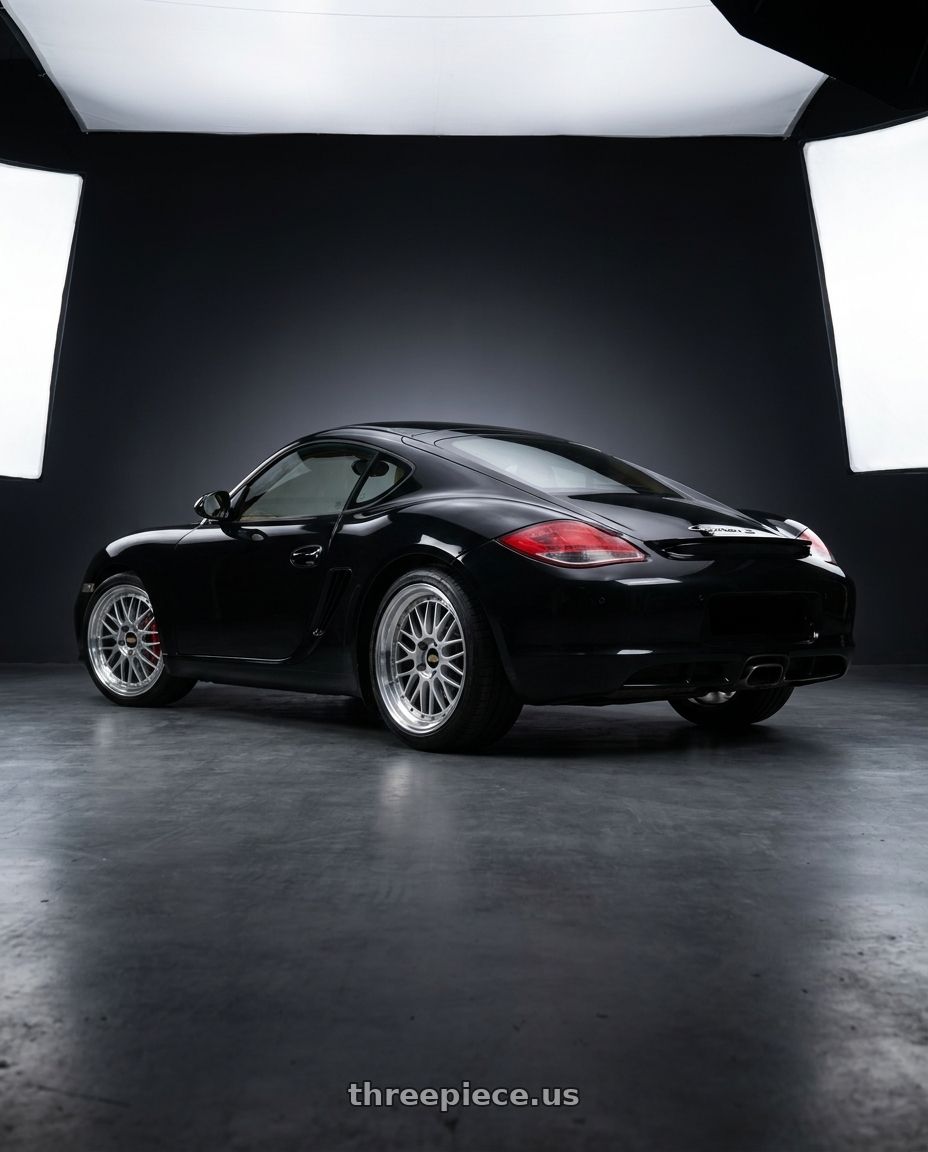 2009 Porsche Cayman S with BBS LM 5x114.3 19x9.0+38 Diamond Silver wheels rear three quarter view square tires