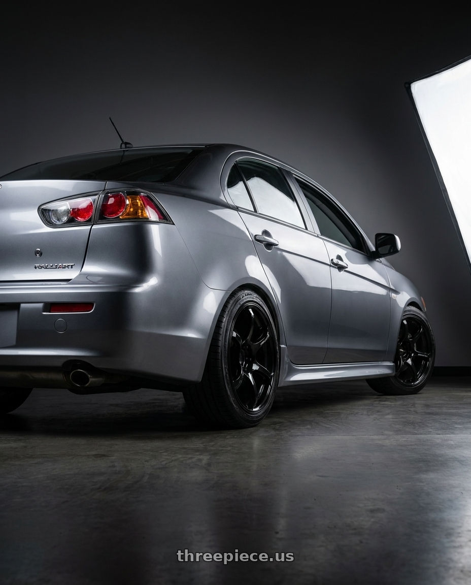 2014 Mitsubishi Lancer Ralliart with Advan RGIII 5x114.3 18x8.0+37 Gloss Black wheels rear three quarter view square tires