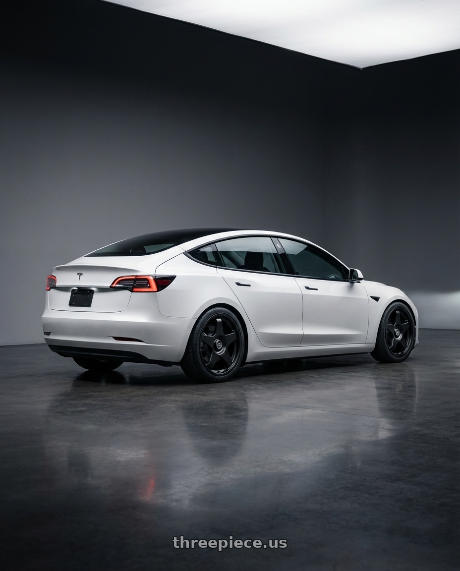 2023 Tesla Model 3 with fifteen52 CHICANE 5x114.3 / 5x120 19x8.5 +35 ASPHALT BLACK (SATIN BLACK) wheels rear three quarter view square tires