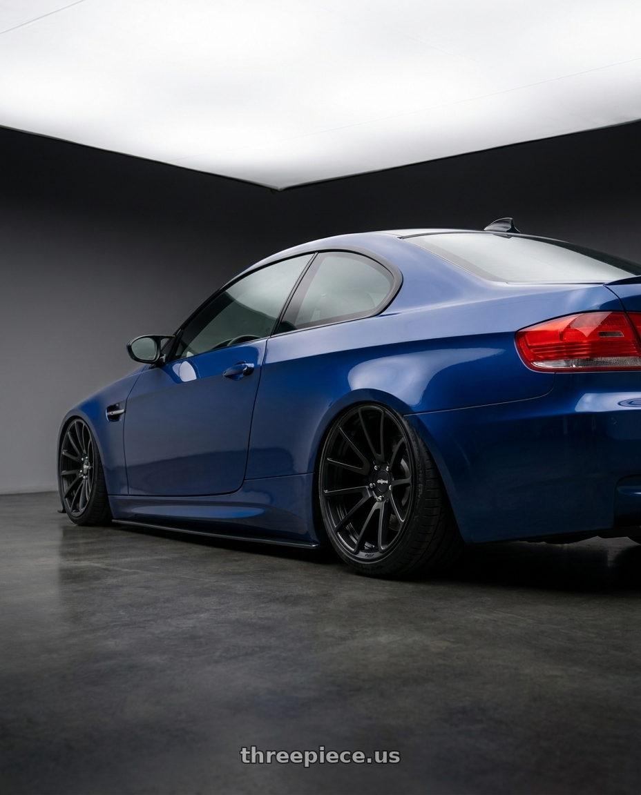 2009 Bmw M3 with Rotiform 1PC R122 SPF 5X114.3 19X8.5 +38 MATTE BLACK wheels rear three quarter view slight stretch tires