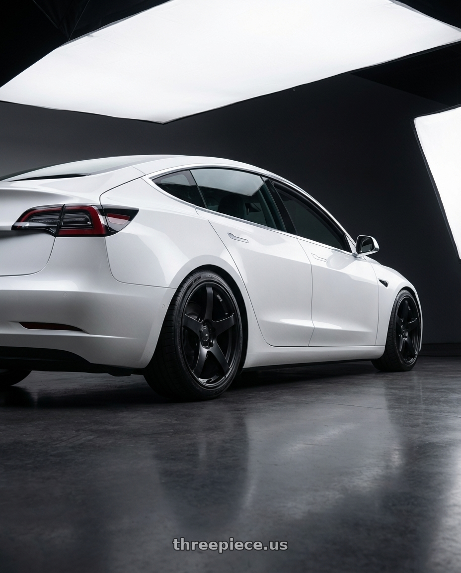 2023 Tesla Model 3 with Ssr Gtv01 5x114.3 19x8.5+38  FLAT BLACK wheels rear three quarter view square tires