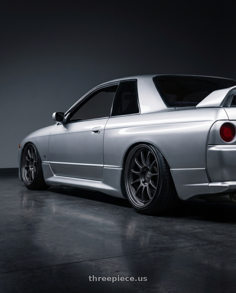 1993 Nissan Skyline with Kansei K13G Corsa 5x114.3 18x10.5 12 Gunmetal wheels rear three quarter view slight stretch tires
