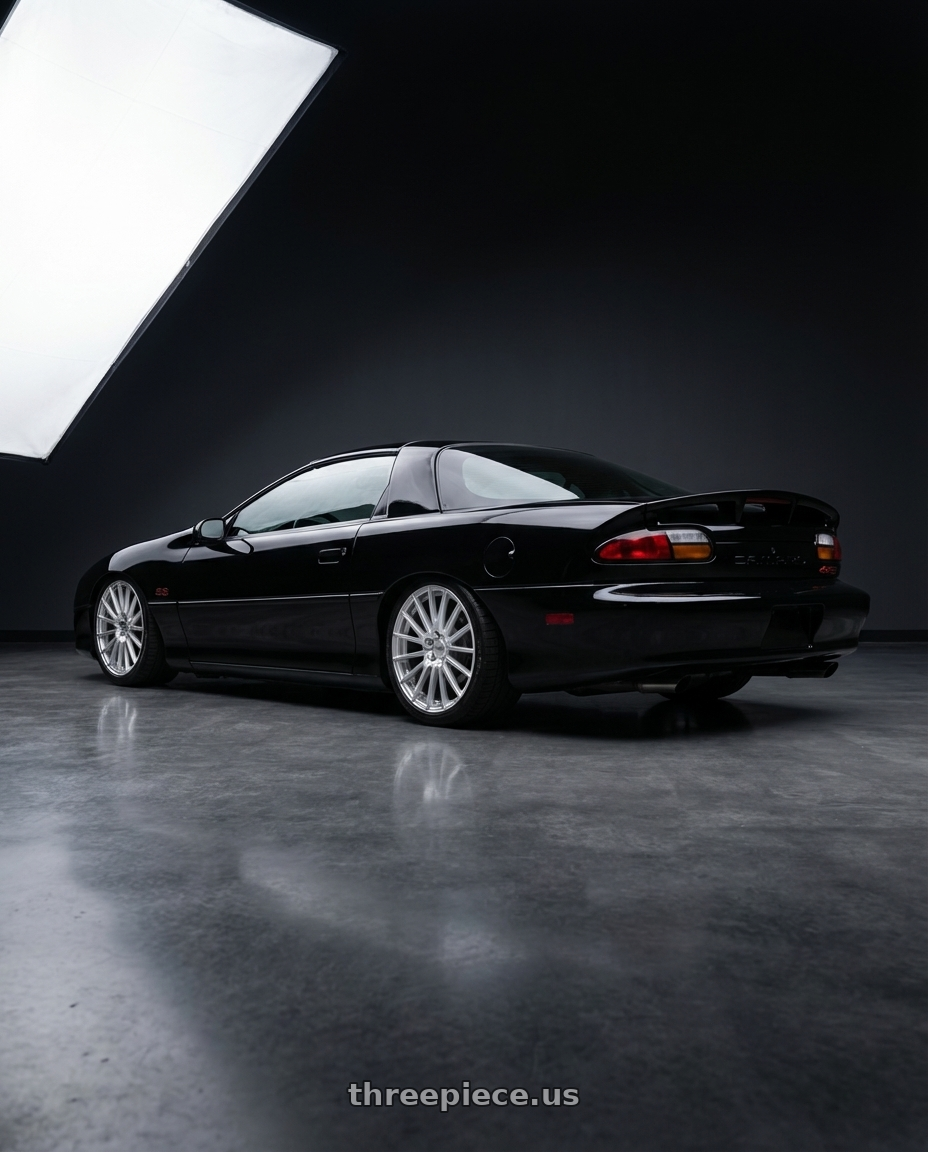 2000 chevrolet camaro with V�xx Capo 5x112/5x120 18x8+45 Silver Mach Face wheels rear three quarter view square tires