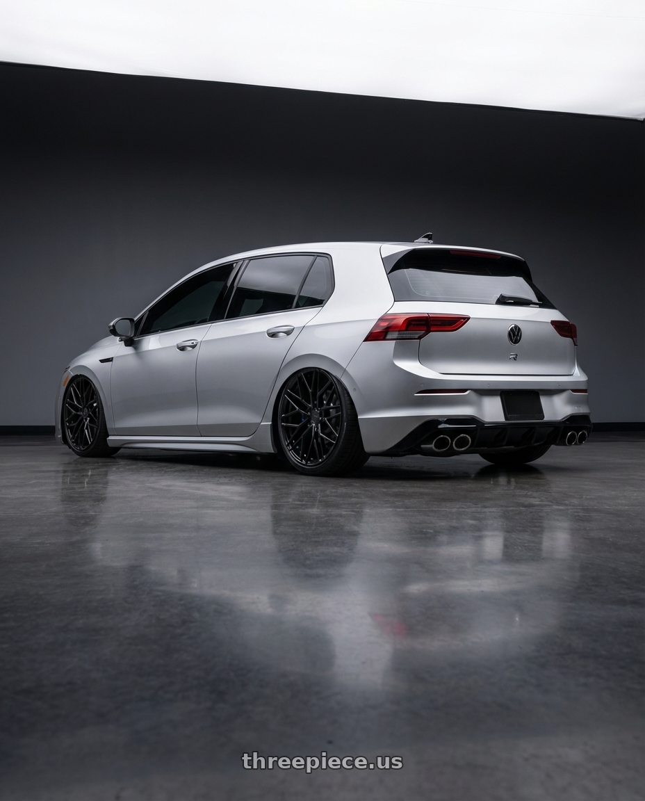 2024 Volkswagen Golf R MK8 with Avant Garde Wheels M520R 5X112 19x8.5 +35 Gloss Black wheels rear three quarter view slight stretch tires