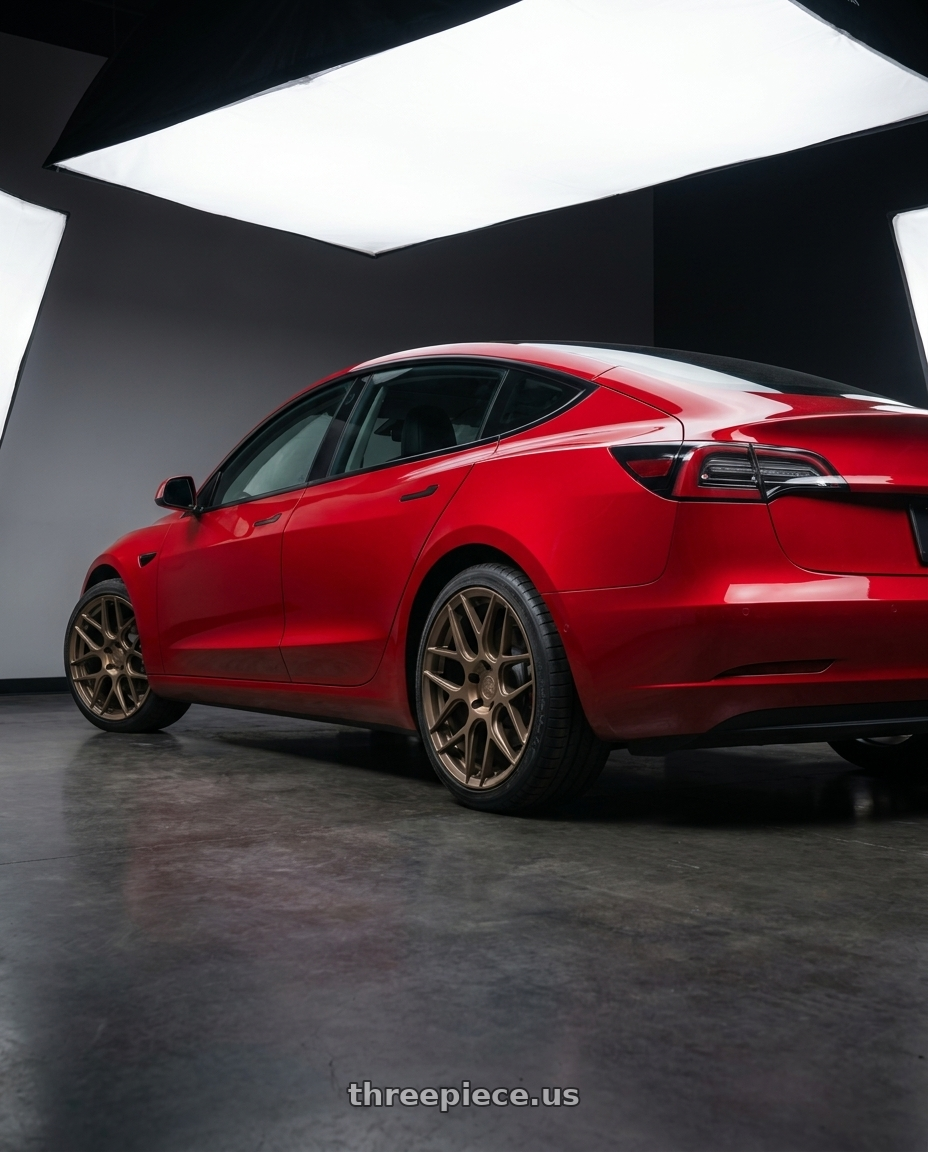 2023 tesla model 3 with Aodhan AFF2 5x114.3 19x8.5+35 Matte Bronze wheels rear three quarter view square tires