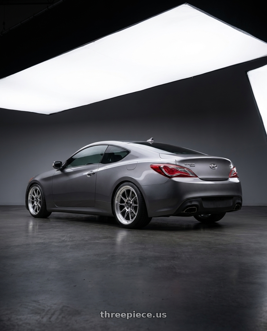 2014 Hyundai Genesis Coupe with Konig Countergram 5x114.3 19x9.5+25 Hyper Chrome / Machined Lip wheels rear three quarter view square tires