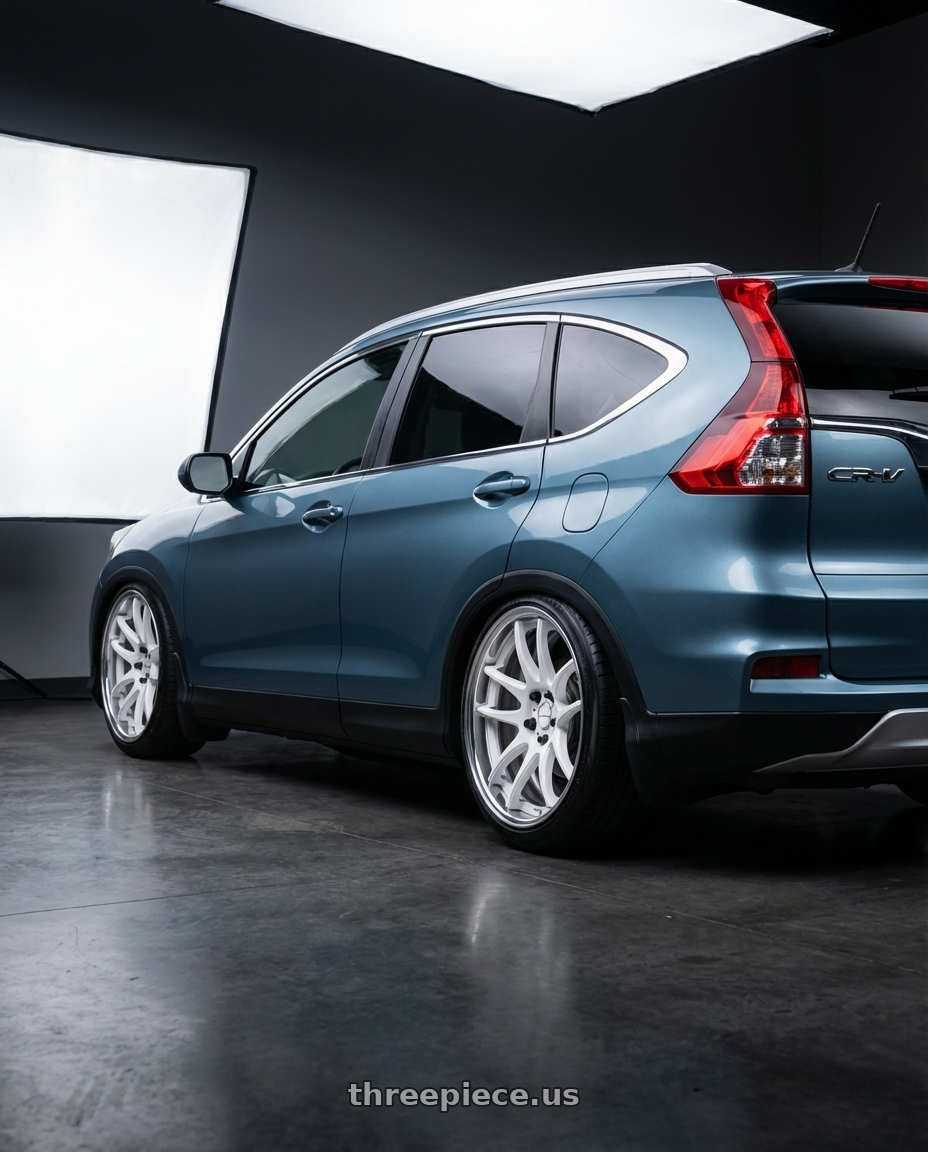 2015 Honda CrV with Work Cr 2P 4x100 17x9.5 +45 Gloss White wheels rear three quarter view slight stretch tires