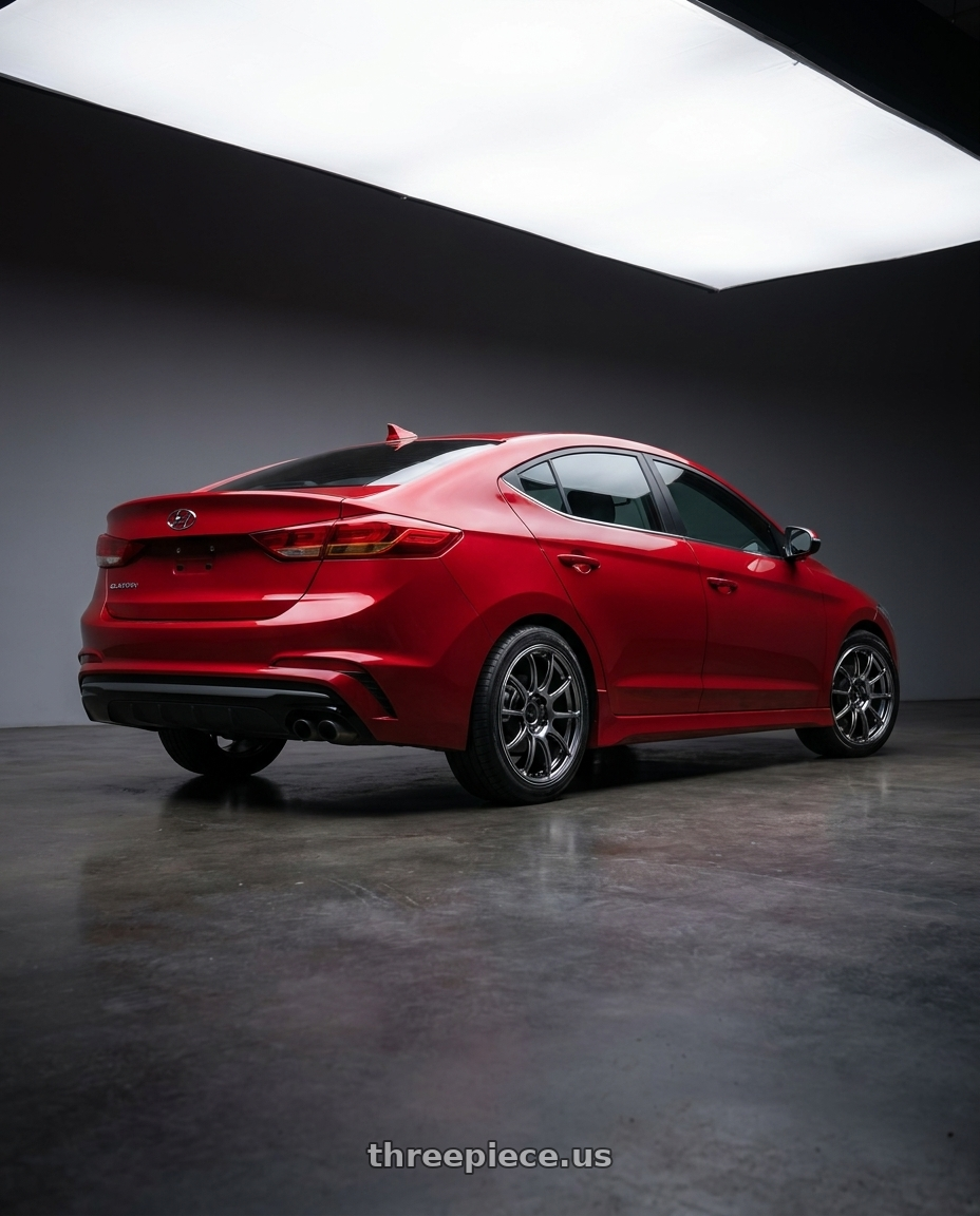 2017 Hyundai Elantra with Advan RZ II 5x114.3 17x8.0+45 Racing Hyper Black And Ring wheels rear three quarter view square tires