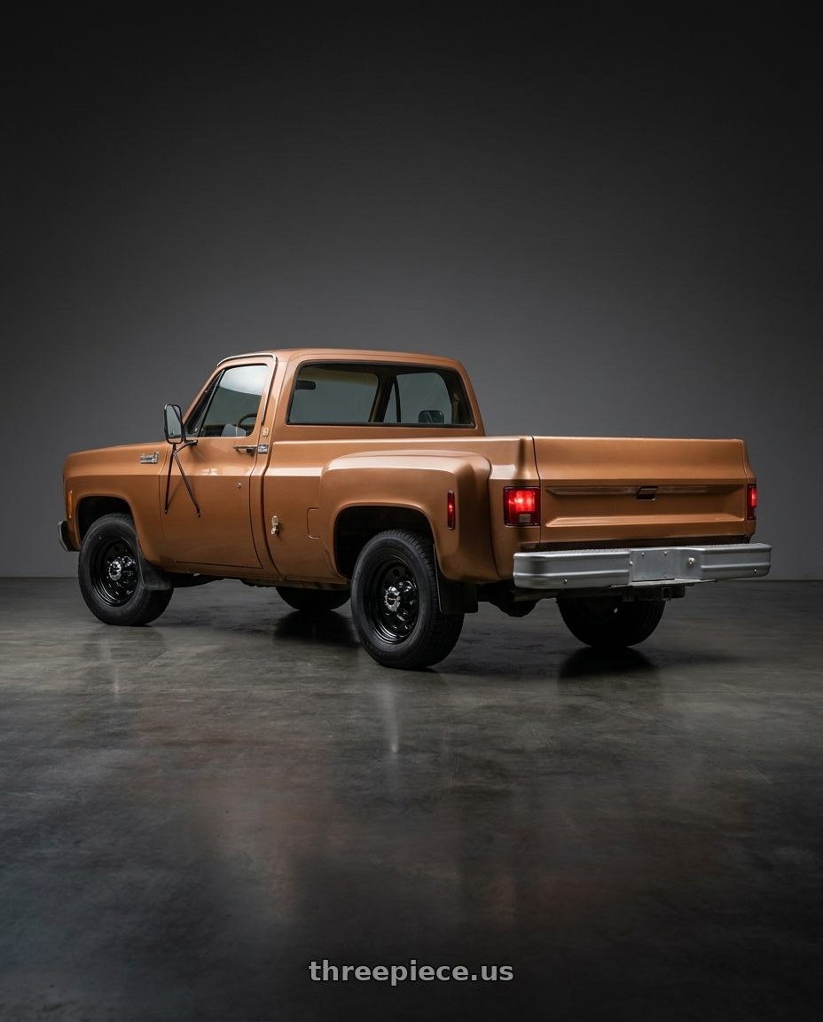 1979 Chevy c30 with Vision HD 85H 8x165.1 16x8-6 Gloss Black wheels rear three quarter view square tires