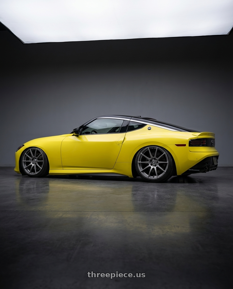 2024 Nissan Z with Forgestar CF10 5x114.3 19x9 +35 Gloss Anthracite wheels rear three quarter view slight stretch tires