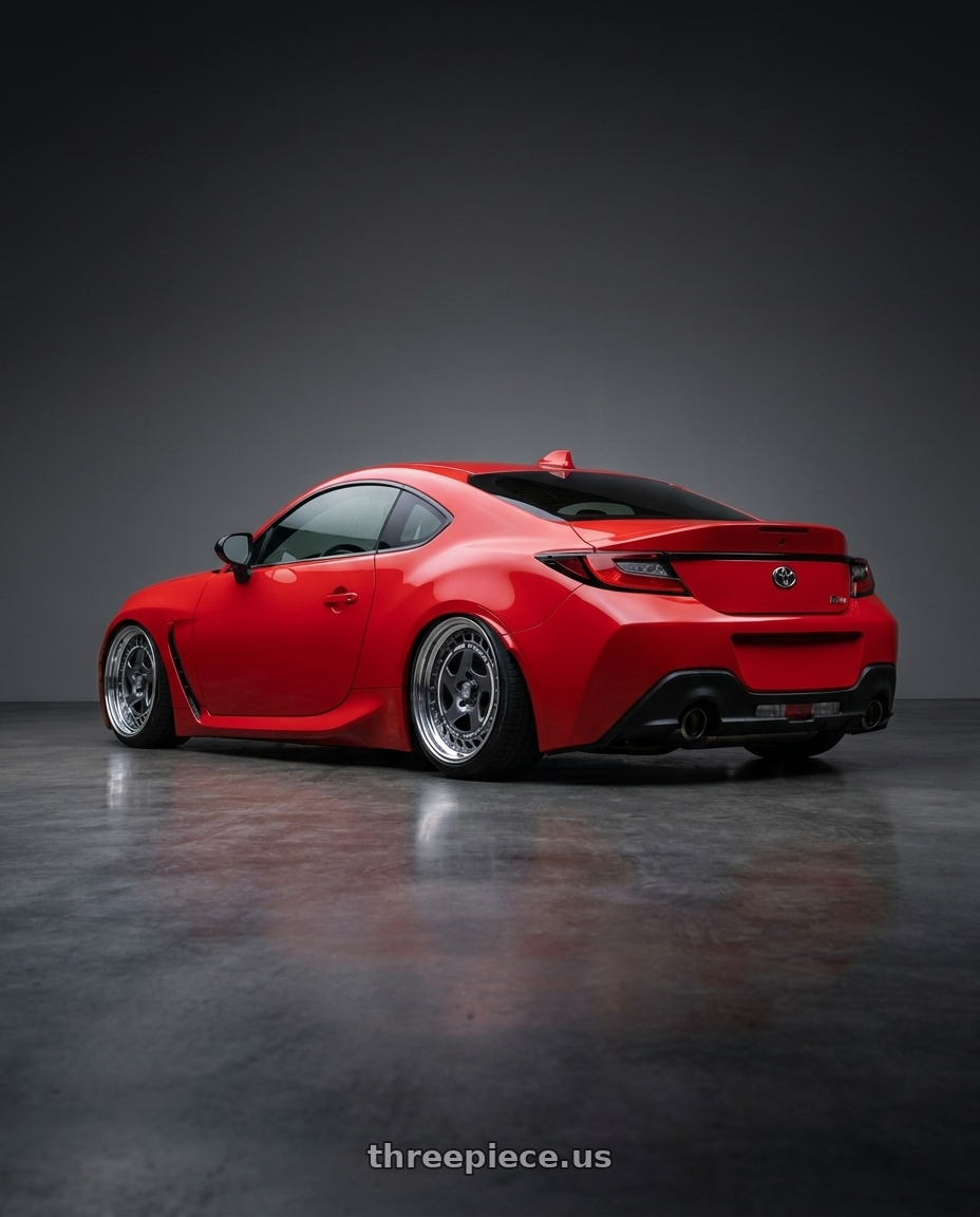 2022 Toyota gr86 with FORMULA AERO SPOKE 5X100 18X9+31 HP Disk Titan Silver wheels rear three quarter view slight stretch tires