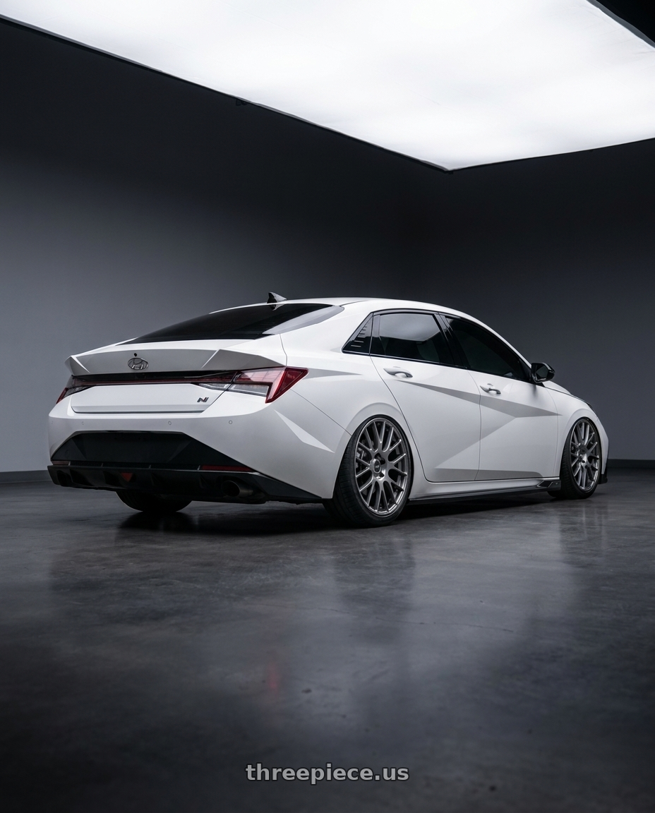 2024 Hyundai Elantra N with Ssr Gtv04 5x114.3 19×8.5x8.5+45  METALLIC GRAY wheels rear three quarter view slight stretch tires