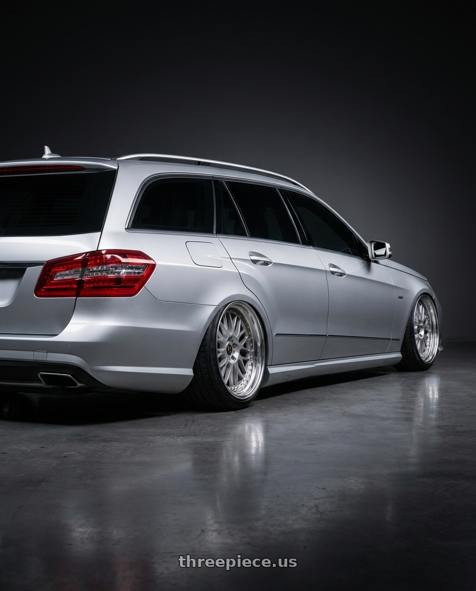 2010 Benz s212 with Work Vs-Xx 5x100 18x8+26 A Disk Light Grey Silver wheels rear three quarter view extreme stretch tires