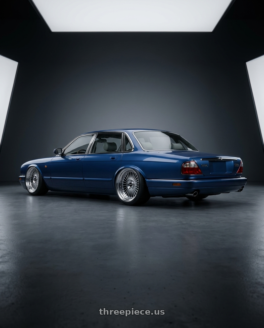 1996 jaguar xj6 with Work Emitz wheels rear three quarter view slight stretch tires
