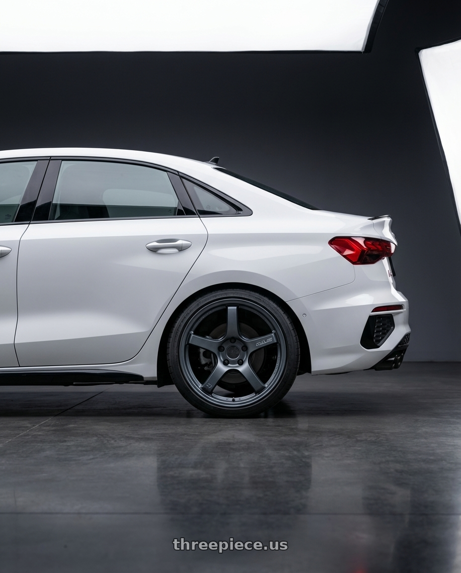 2024 Audi S3 8Y with Gram Lights 57CR 5x112 19x9.5+25 Gunblue II wheels rear three quarter view square tires