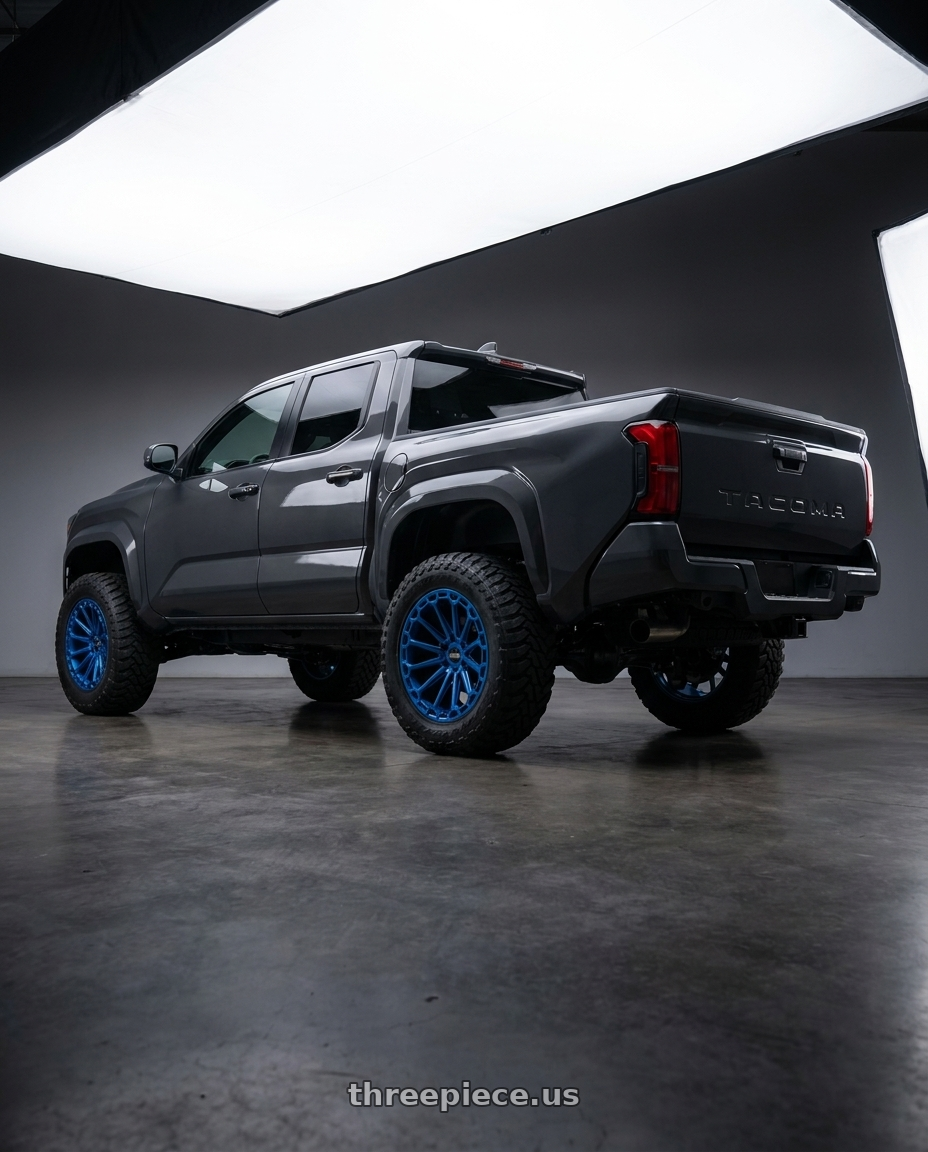 toyota tacoma 4th gen 2024 sr rwd with Black Rhino KAIZEN 6X135 20X9.5 +12 DEARBORN BLUE wheels rear three quarter view meaty tires