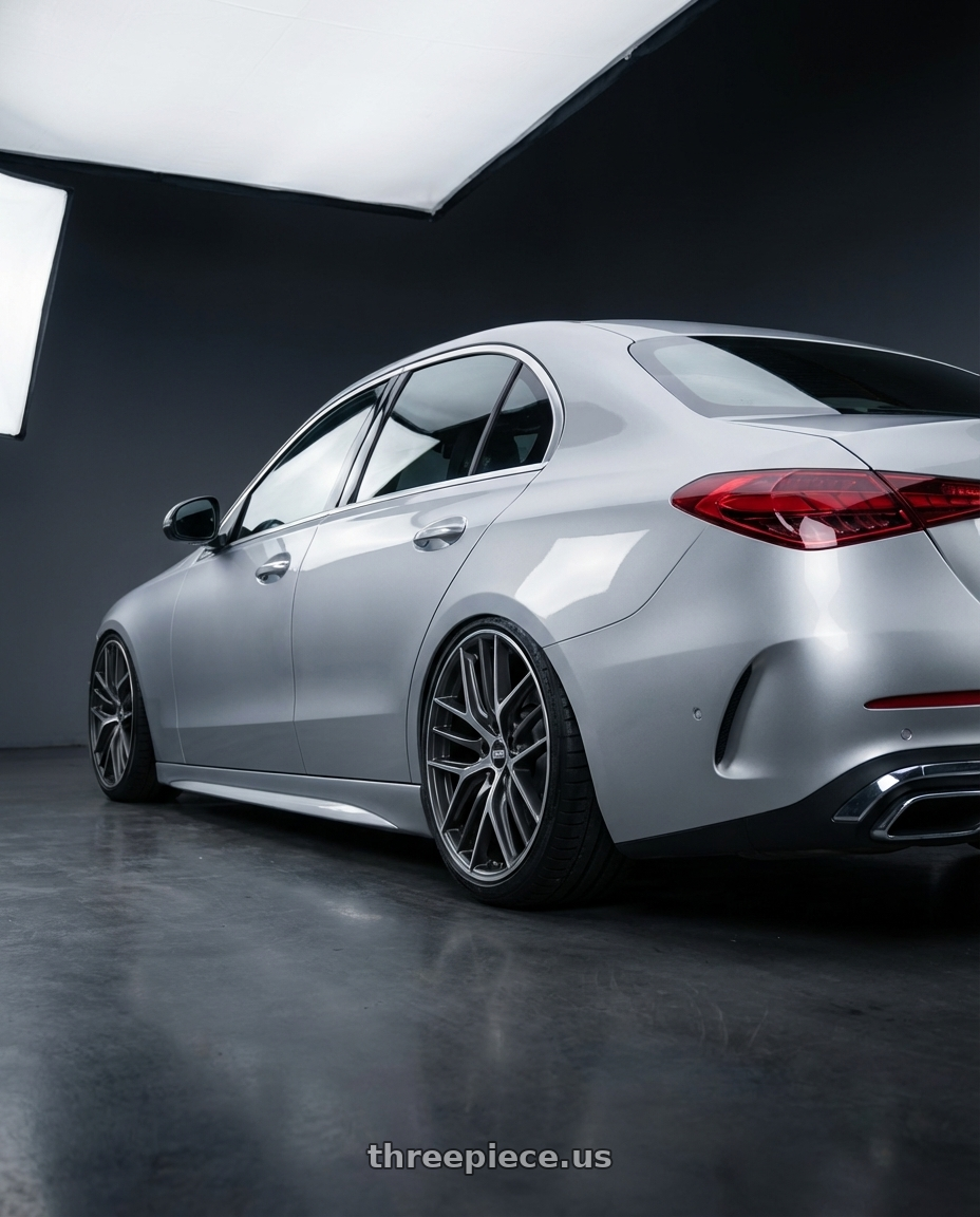 2022 Mercedes-Benz C-Class W206 with BBS CC-R 5x112 19x9.5+42 Graphite w/ Diamond Cut Face wheels rear three quarter view slight stretch tires