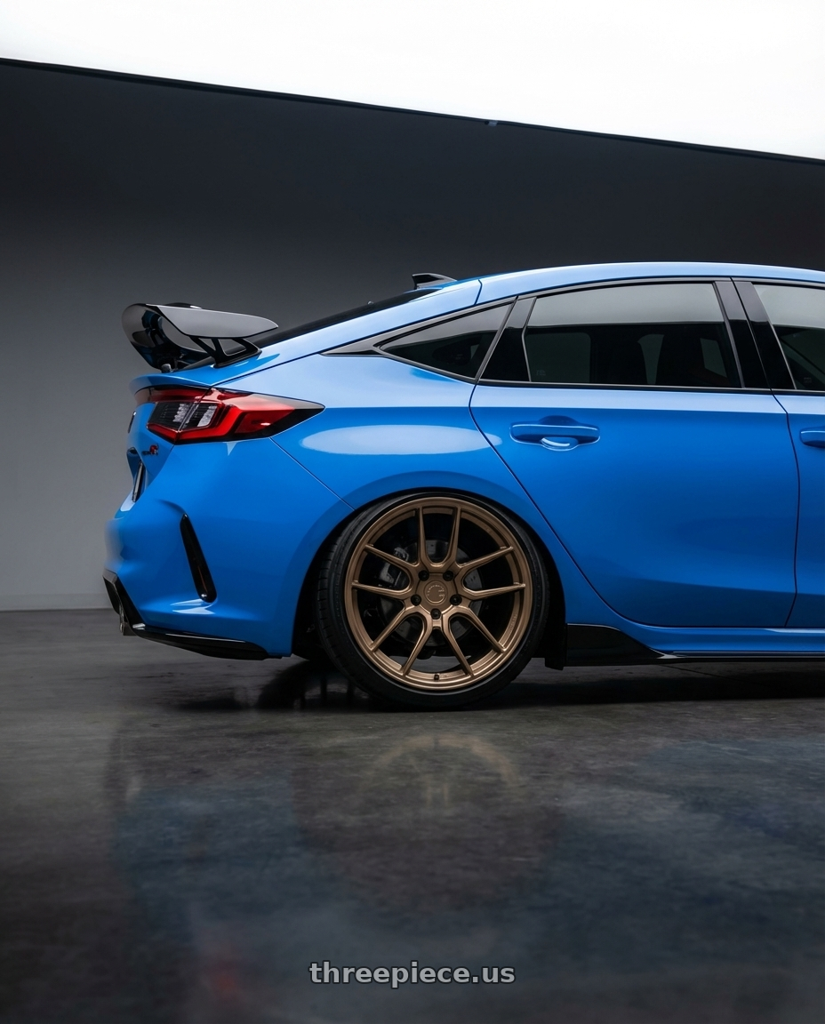 2024 Honda Civic Type R with Aodhan AFF2 5x120 19x8.5+35 Matte Bronze wheels rear three quarter view slight stretch tires
