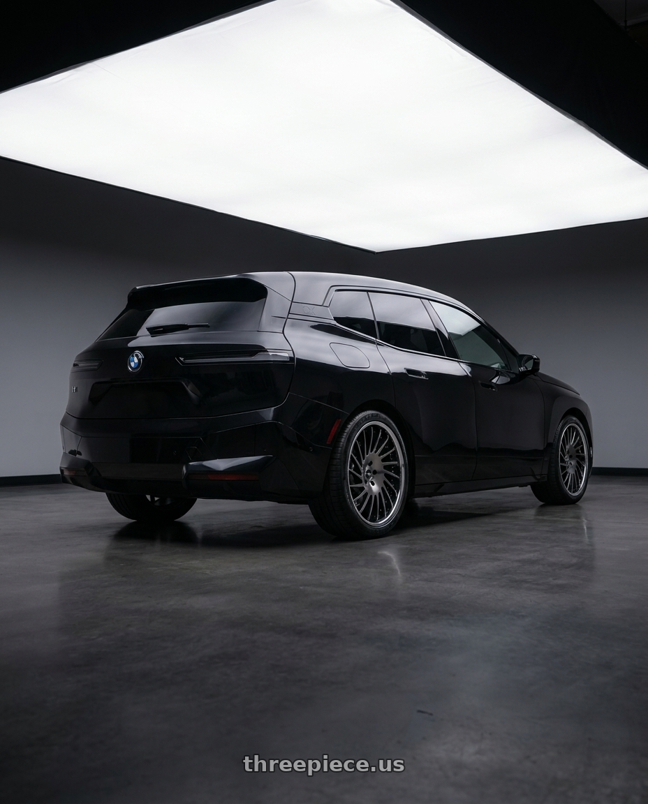 2024 bmw ix with SSR CV05S 5X112 21X9+33 HP Disk Galaxy Clear Black wheels rear three quarter view square tires