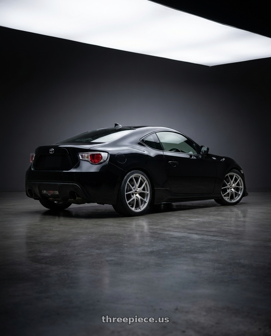 2014 toyota gt86 with BBS RI-A 5x100 18x9.5 +45 Diamond Silver wheels rear three quarter view square tires