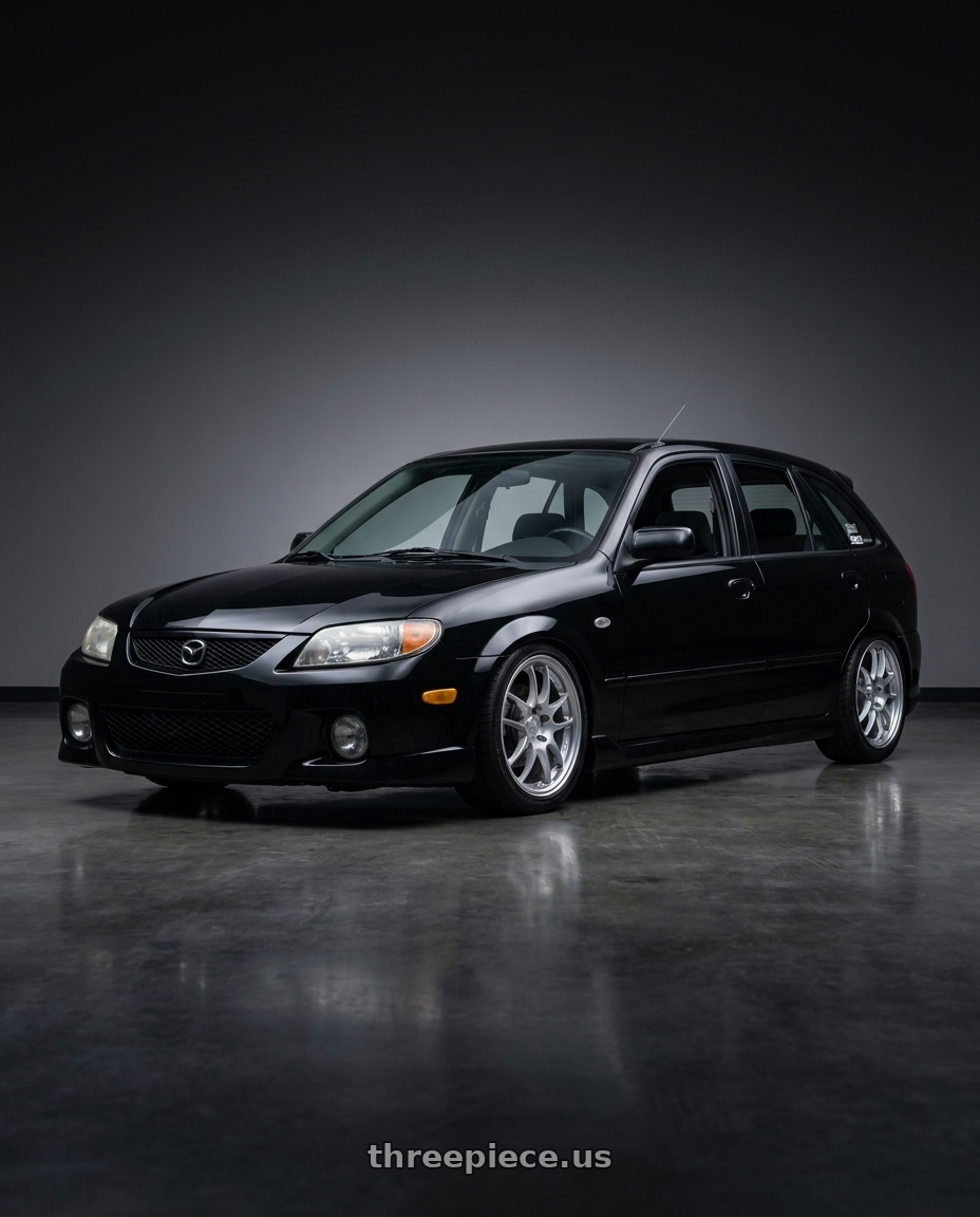 2002 Mazda Protege5 with Enkei PF01 5x114.3 17x7.5+38 Silver wheels