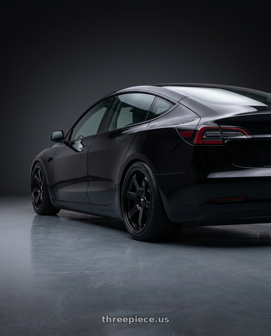 2023 tesla model 3 with F1R F106 5x114.3 17x8 +35 Gloss Black wheels rear three quarter view square tires